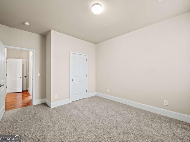 unfurnished bedroom with carpet