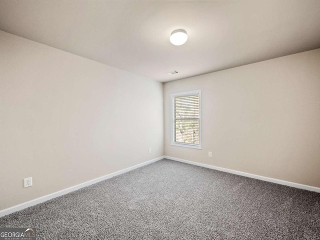 view of carpeted spare room