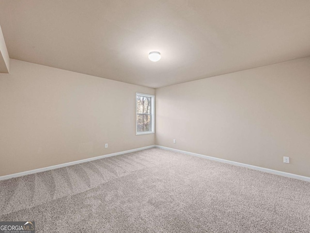 spare room with carpet flooring