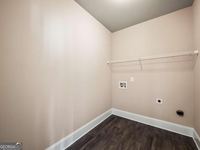 laundry area with electric dryer hookup, dark wood-type flooring, and washer hookup