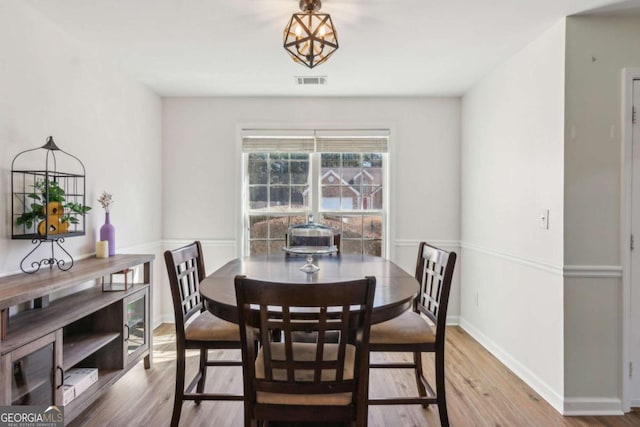 dining area featuring hardwood / wood-style floors