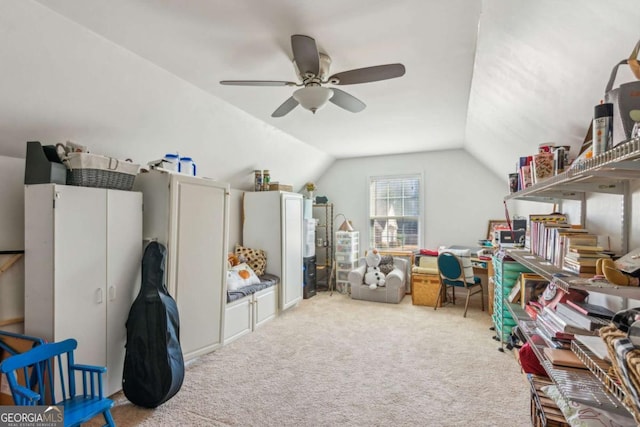 recreation room featuring ceiling fan, carpet, and lofted ceiling