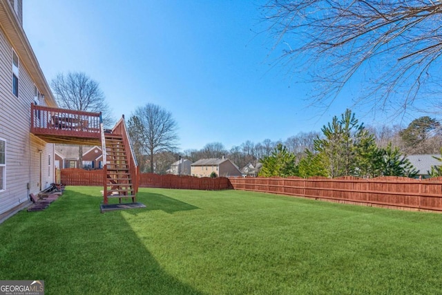 view of yard with a deck