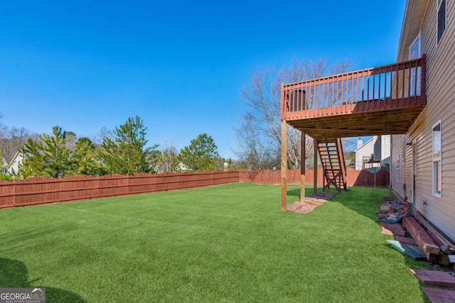 view of yard featuring a deck