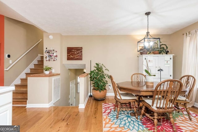 dining room with light hardwood / wood-style flooring