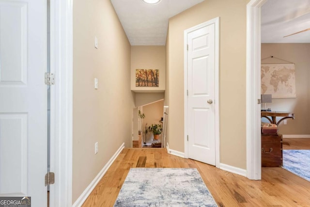 hall with light wood-type flooring