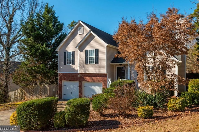 view of front of property featuring a garage