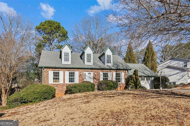 view of new england style home