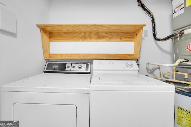 laundry room featuring washing machine and clothes dryer