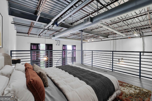 bedroom featuring wood-type flooring