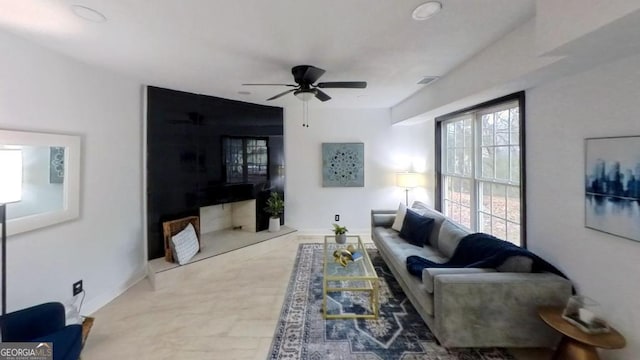 living room featuring ceiling fan