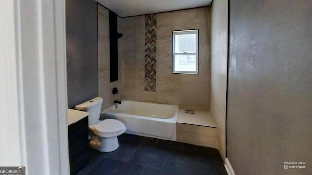 bathroom featuring toilet and vanity