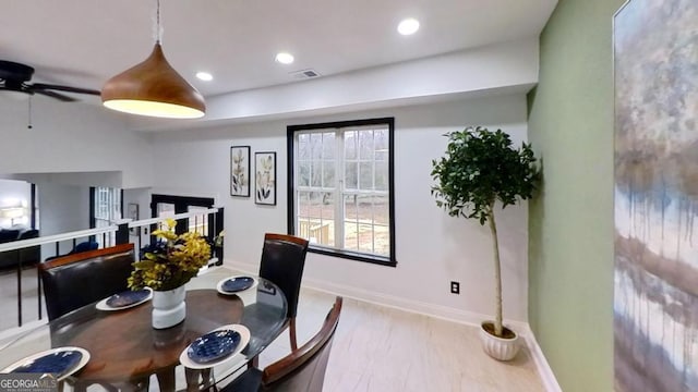 dining space featuring ceiling fan