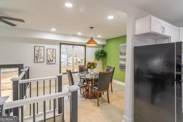 interior space featuring ceiling fan