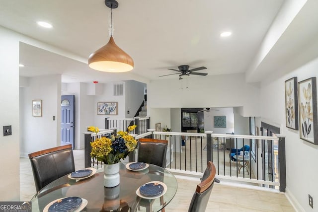 dining area featuring ceiling fan