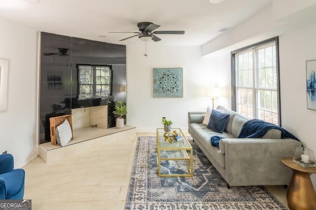 living room featuring ceiling fan