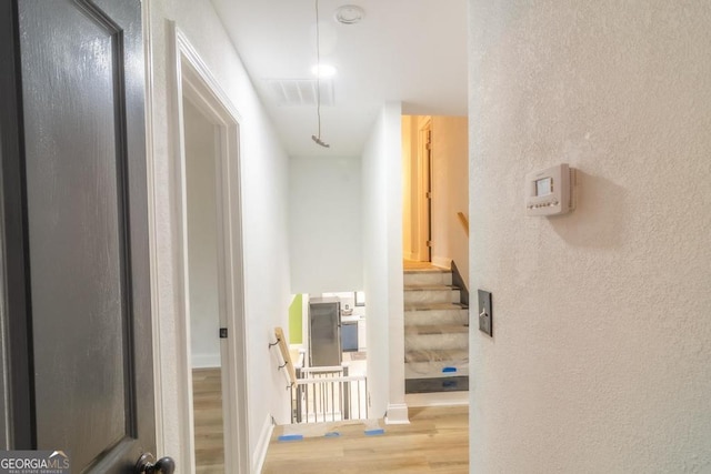 hall featuring wood-type flooring