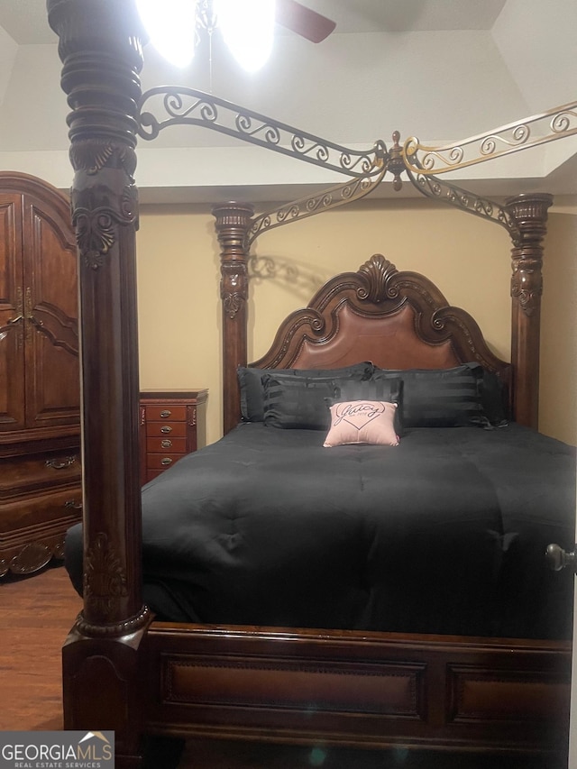 bedroom featuring wood finished floors