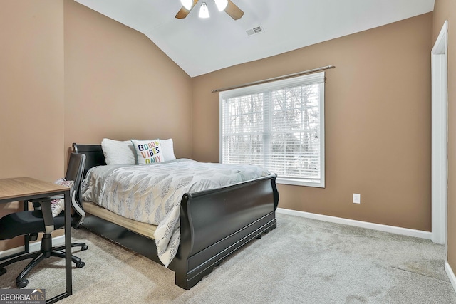 carpeted bedroom with lofted ceiling and ceiling fan