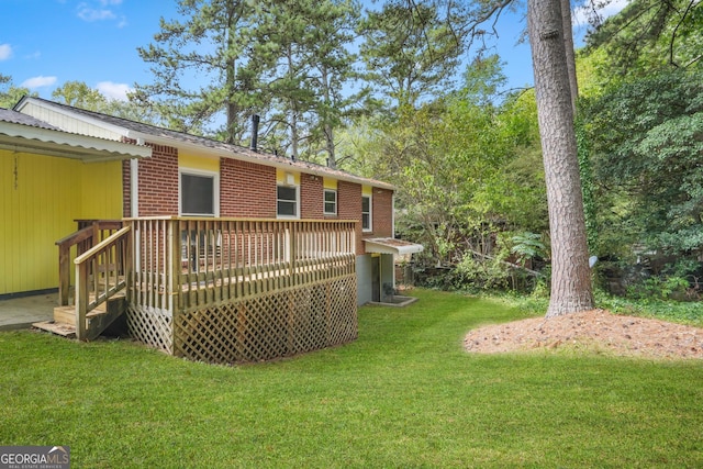 view of yard featuring a deck