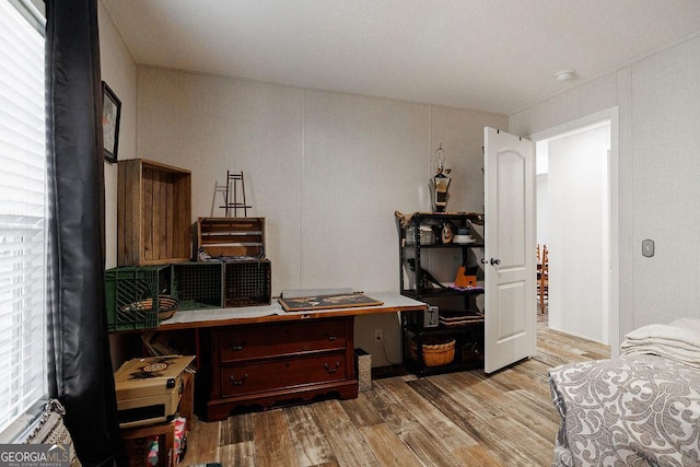 office space with light wood-type flooring