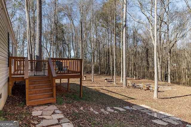 view of yard featuring a deck