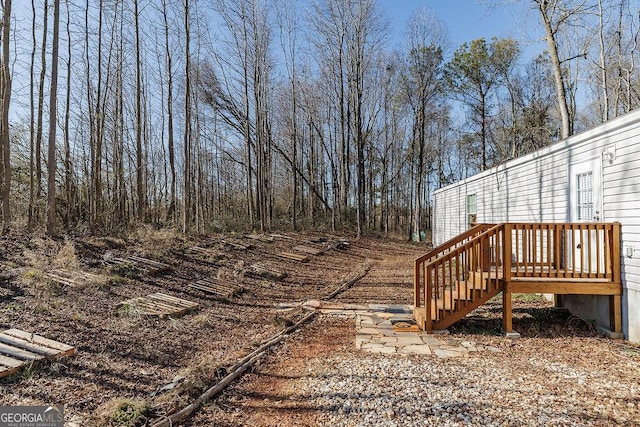 view of yard featuring a deck