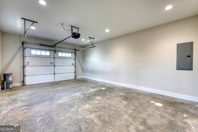 garage with electric panel and a garage door opener