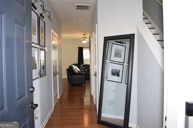 hallway featuring dark hardwood / wood-style floors