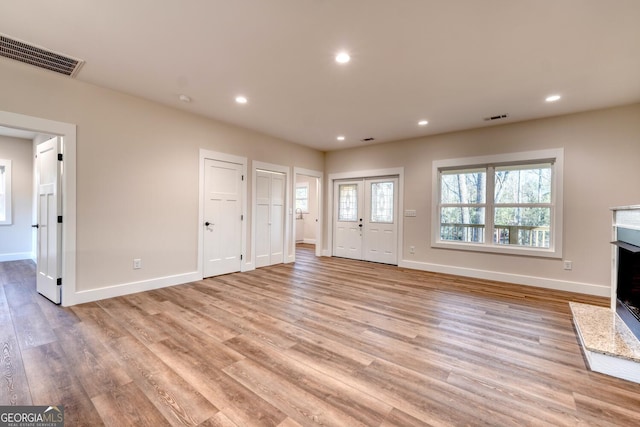 entrance foyer featuring light hardwood / wood-style floors