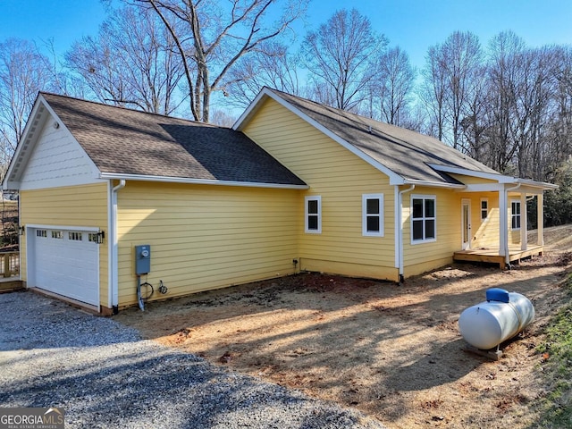 view of property exterior featuring a garage