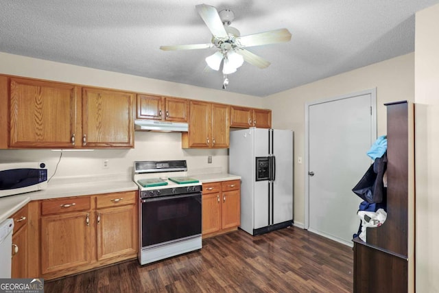 kitchen featuring ceiling fan, white appliances, dark wood-type flooring, and a textured ceiling