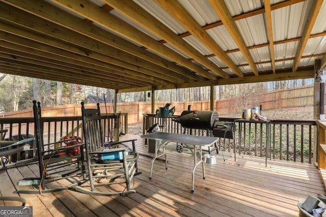 wooden terrace featuring area for grilling