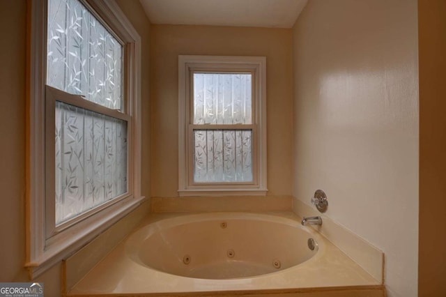 bathroom with a washtub