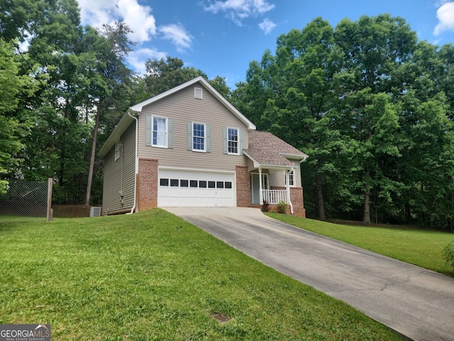 view of front facade with an attached garage, driveway, brick siding, and a front yard