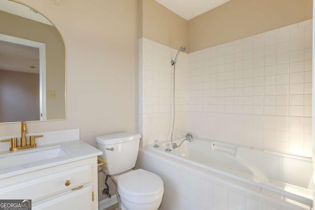 full bath with toilet, tiled shower / bath, and vanity