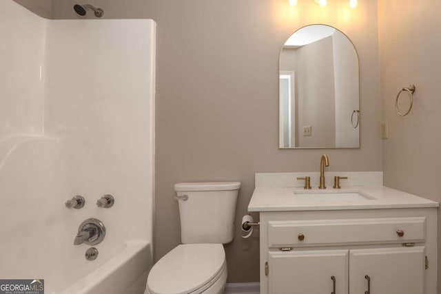 full bathroom with toilet, vanity, and shower / bathing tub combination