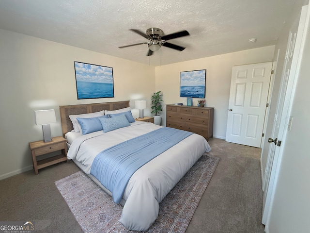 bedroom with ceiling fan, a textured ceiling, and carpet