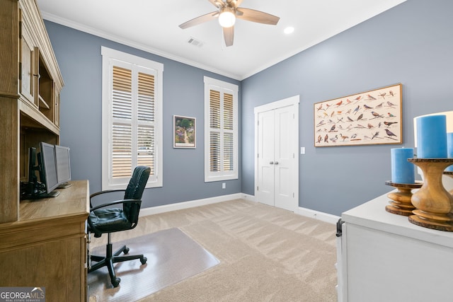 carpeted office with ceiling fan and ornamental molding