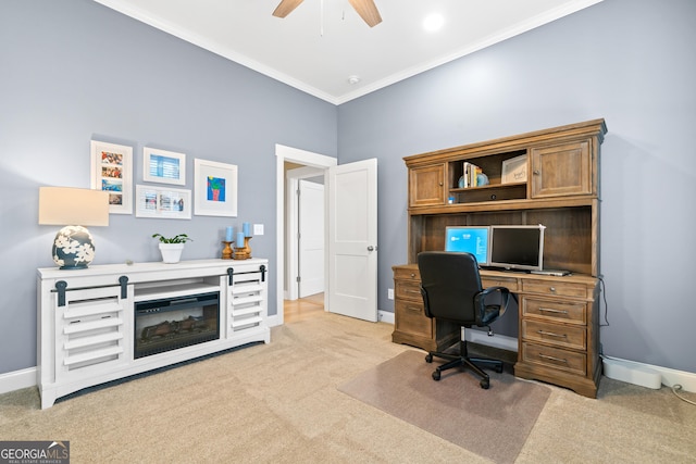 carpeted office with ceiling fan and ornamental molding