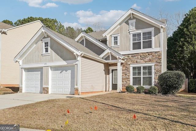 view of front facade featuring a garage and a front lawn