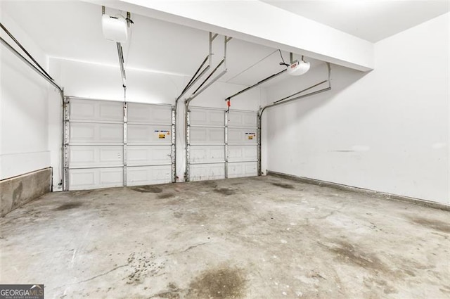 garage featuring a garage door opener