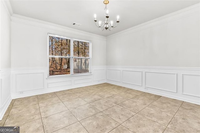 unfurnished dining area featuring crown molding, a chandelier, and light tile patterned flooring