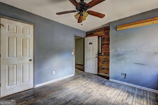 unfurnished bedroom with wood-type flooring and ceiling fan