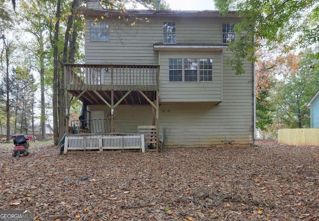 rear view of property with a deck