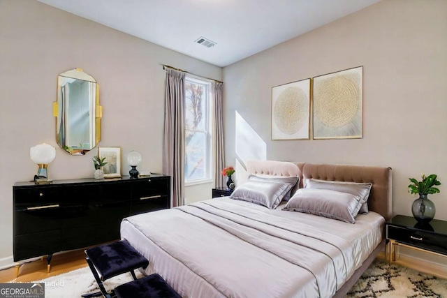 bedroom featuring light hardwood / wood-style flooring