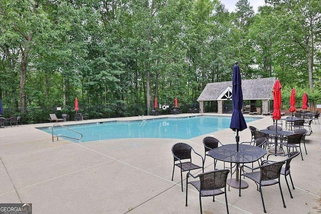 view of pool with a patio area