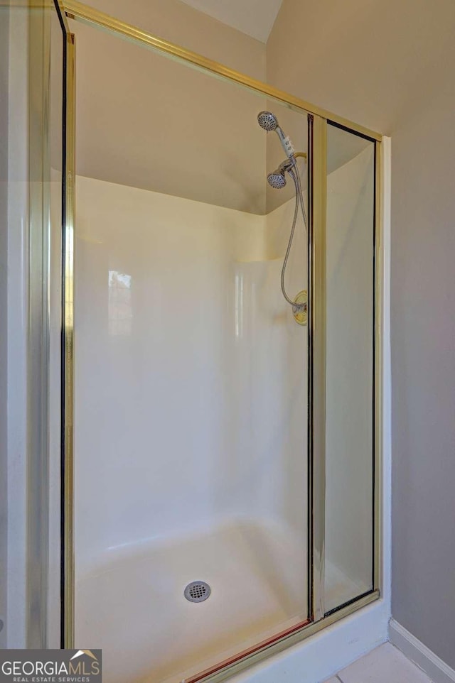 bathroom featuring walk in shower