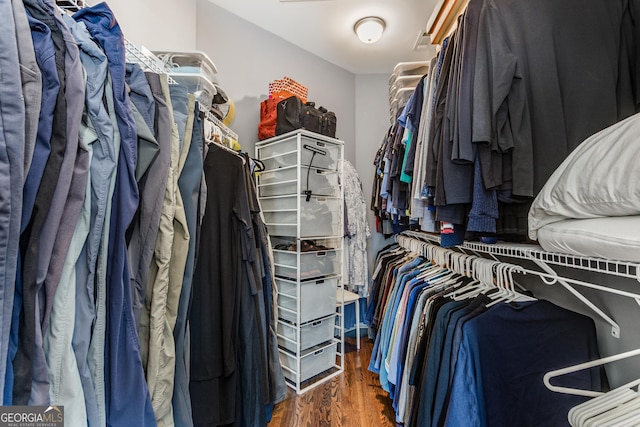 spacious closet with wood finished floors