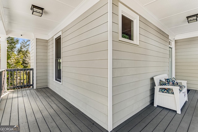 wooden deck featuring a porch